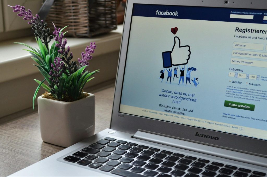 create a social media marketing strategy Photo of Laptop Near Plant